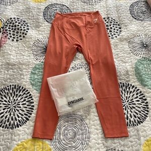 Women’s large GymShark orange leggings — brand new in bag